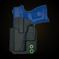 Custom black Kydex Beretta APX IWB holster with green washers