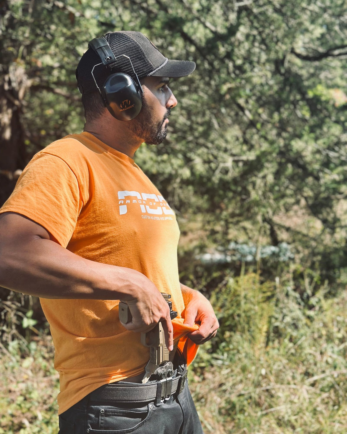 AOG Shirt in Marmalade worn on the range