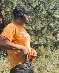 AOG Shirt in Marmalade worn on the range