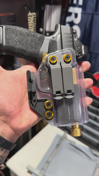 Clear Kydex IWB holster on a Springfield Hellcat Pro with a Holosun optic and threaded barrel