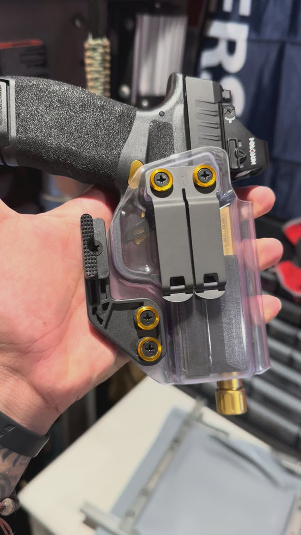 Clear Kydex IWB holster on a Springfield Hellcat Pro with a Holosun optic and threaded barrel